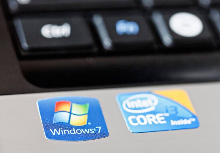 Windows 7 and Intel CORE Inside stickers on laptop.