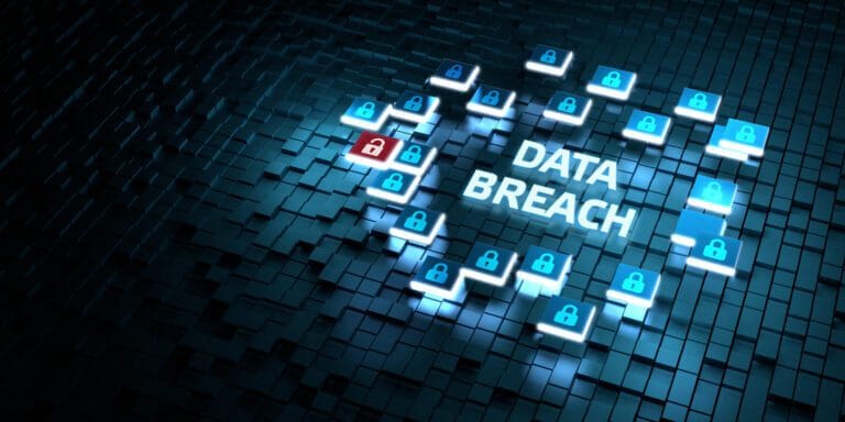 Words data breach surrounded by locks.