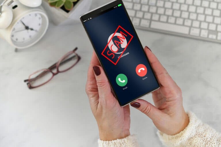 Mobile phone with inbound scam phone call.