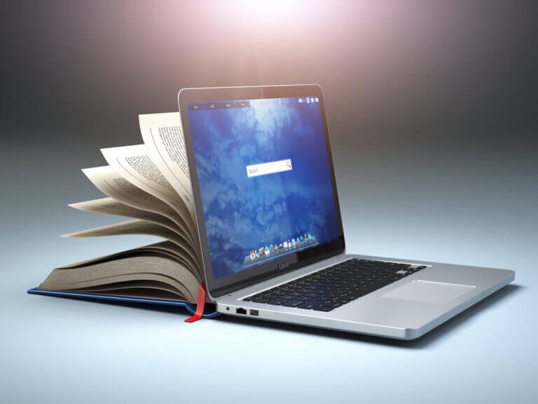 Open laptop and notebook.