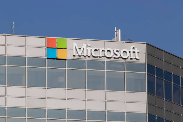 Microsoft buliding with view of the logo.
