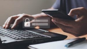 Password authentication between a mobile phone and laptop.