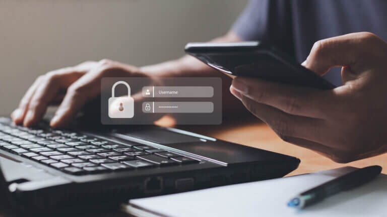 Password authentication between a mobile phone and laptop.