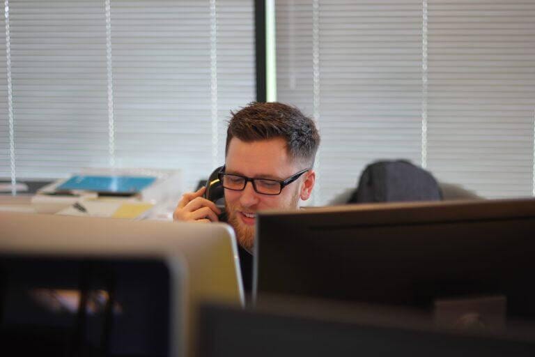 Staff at Berkeley communications working on the phone.