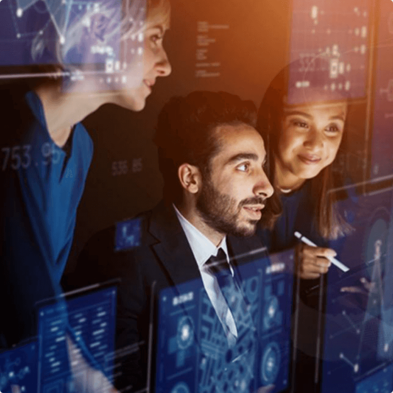Employees in a meeting reviewing cybersecurity business projects.